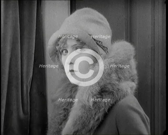 Scene from the Film 'Champagne': Betty Balfour Entering a Bedroom With a Male..., 1920s. Creator: British Pathe Ltd.