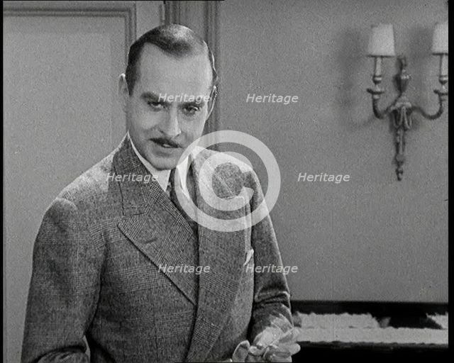 Scene from the Film 'Champagne': Betty Balfour Entering a Bedroom With a Male..., 1920s. Creator: British Pathe Ltd.