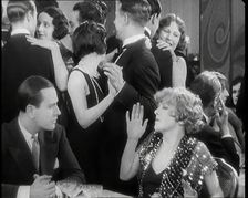 Scene from the Film Champagne': Betty Balfour in a Nightclub Drinking Champagne and..., 1920s. Creator: British Pathe Ltd