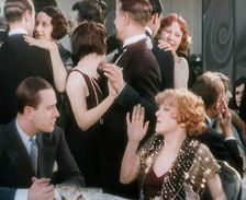 Scene from the Film Champagne': Betty Balfour in a Nightclub Drinking Champagne and..., 1920s. Creator: British Pathe Ltd