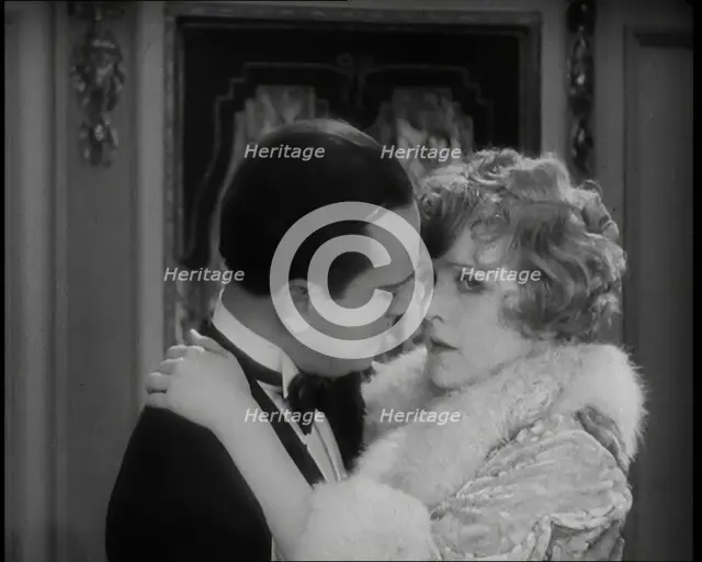 Scene from the Film 'Champagne': The Actress Betty Balfour Embracing the Male Actor Jean..., 1920s. Creator: British Pathe Ltd.