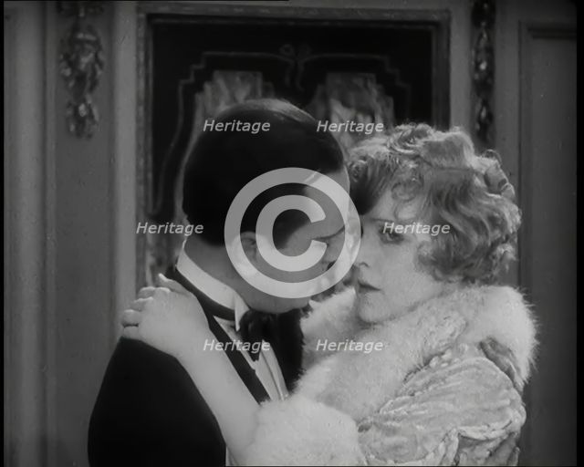 Scene from the Film 'Champagne': The Actress Betty Balfour Embracing the Male Actor Jean..., 1920s. Creator: British Pathe Ltd.