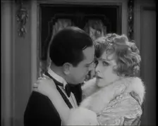 Scene from the Film Champagne': The Actress Betty Balfour Embracing the Male Actor Jean..., 1920s. Creator: British Pathe Ltd