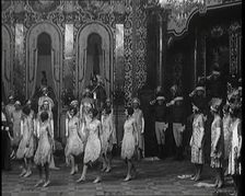 Scene from the Musical Princess Charming: a Group of Actors Dancing As the Actor Playing..., 1920s. Creator: British Pathe Ltd
