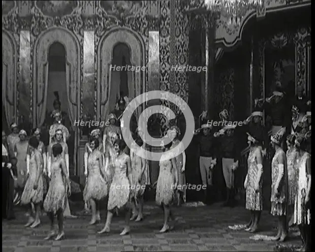 Scene from the Musical Princess Charming: a Group of Actors Dancing As the Actor Playing..., 1920s. Creator: British Pathe Ltd.