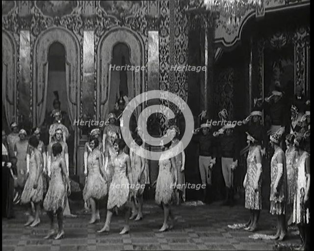 Scene from the Musical Princess Charming: a Group of Actors Dancing As the Actor Playing..., 1920s. Creator: British Pathe Ltd.