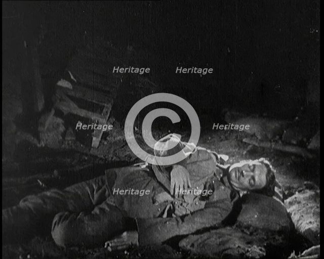 Scene from the Short Silent Feature Film 'Poppies of Flanders'. A Male Actor Portraying a..., 1920s. Creator: British Pathe Ltd.
