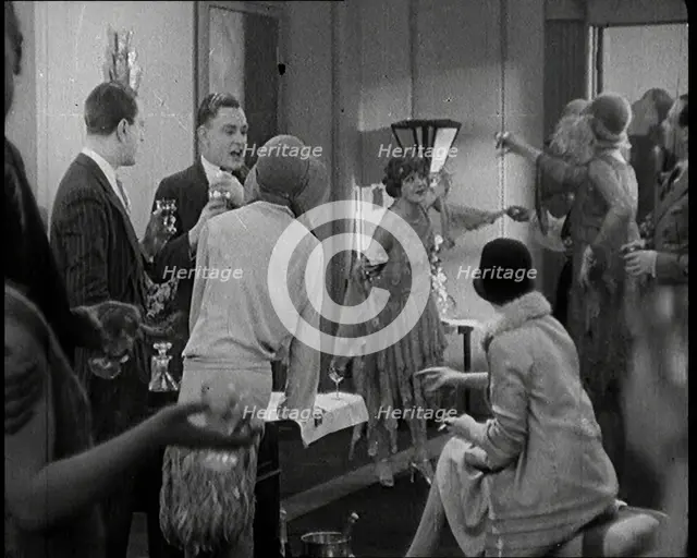 Scene from a 1920s Film. A Group of Actors Playing Bright Young Things Having a Cocktail Party,1920s Creator: British Pathe Ltd.