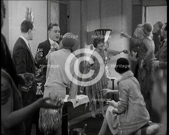 Scene from a 1920s Film. A Group of Actors Playing Bright Young Things Having a Cocktail Party,1920s Creator: British Pathe Ltd.