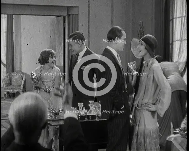 Scene from a 1920s Film. A Group of Actors Playing Bright Young Things Having a Cocktail Party,1920s Creator: British Pathe Ltd.