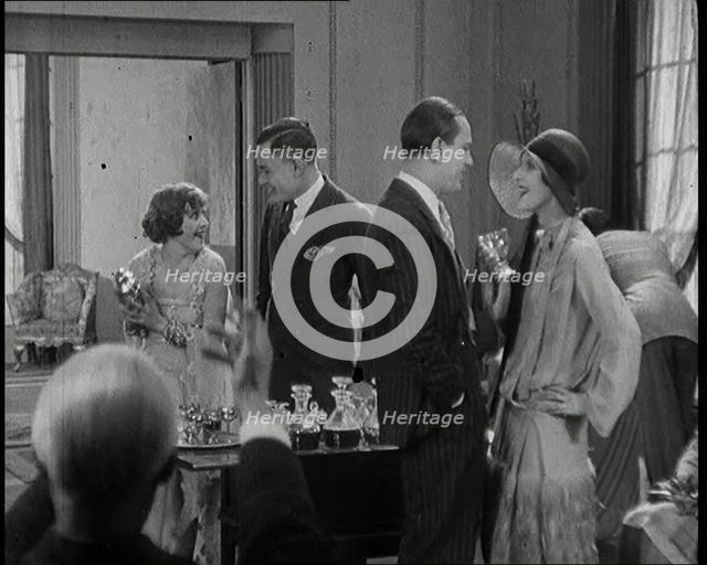 Scene from a 1920s Film. A Group of Actors Playing Bright Young Things Having a Cocktail Party,1920s Creator: British Pathe Ltd.