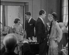 Scene from a 1920s Film. A Group of Actors Playing Bright Young Things Having a Cocktail Party,1920s Creator: British Pathe Ltd