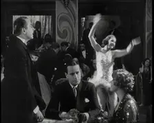 Scene from a 1920s Film. Two Actors Portraying a Couple in a Night Club Scene Whilst a Band...,1920s Creator: British Pathe Ltd