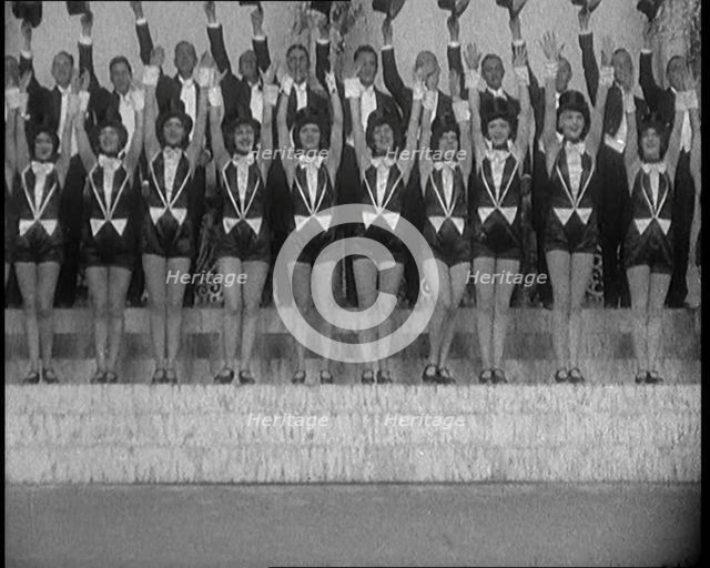 Scene from a Stage Show: a Large Dance Troop Tap Dancing on Steps in Top Hats, 1929. Creator: British Pathe Ltd.