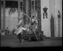Scene from a Stage Show: Male and Female Civilian Dancing on a Stage in a Routine with..., 1929. Creator: British Pathe Ltd