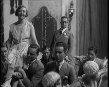 Scene from a Stage Show: Male and Female Civilians Dancing on a Stage in a Routine with..., 1929. Creator: British Pathe Ltd