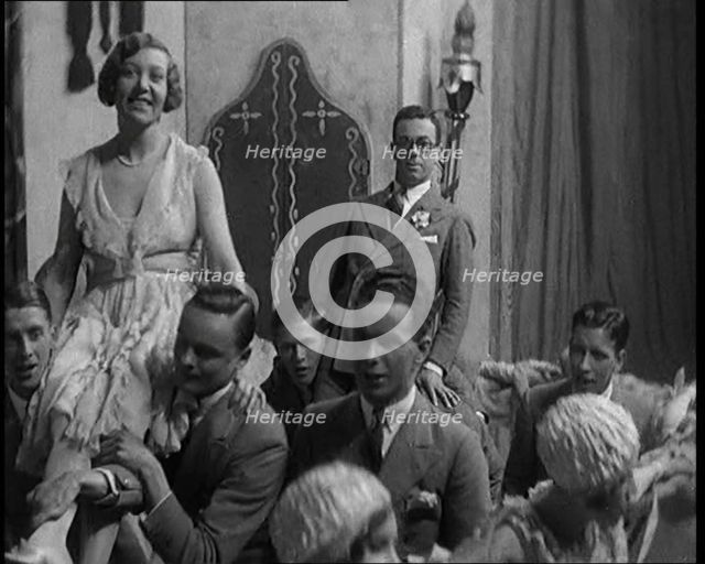 Scene from a Stage Show: Male and Female Civilians Dancing on a Stage in a Routine with..., 1929. Creator: British Pathe Ltd.