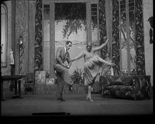 Scene from a Stage Show: Male and Female Civilians Dancing on a Stage in a Routine with..., 1929. Creator: British Pathe Ltd