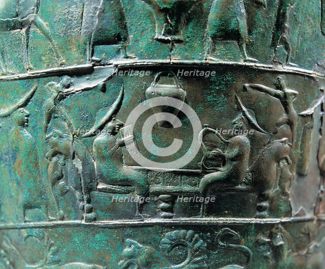 Scene from a situla in bronze of the Certusa of Bologna with a character playing the harp and ano…