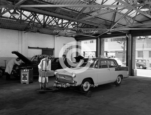 Scene in Globe & Simpson's auto electrical workshop, Nottingham, Nottinghamshire, 1961. Creator: Michael Walters.
