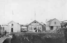 Scene in front of Ott and Scheele's general merchandise store, between c1900 and 1916. Creator: Unknown