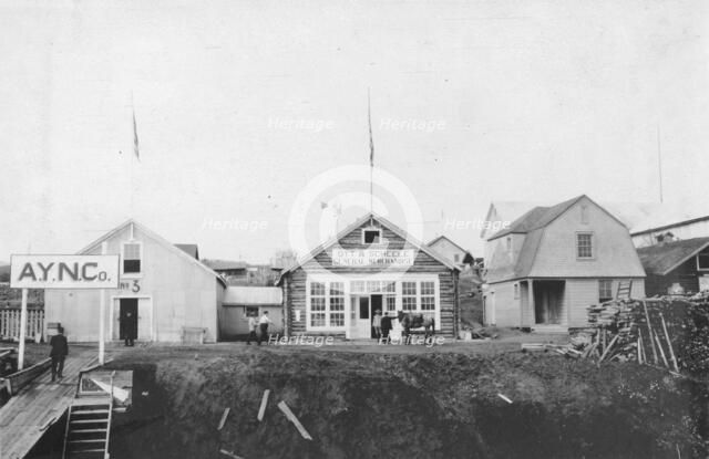 Scene in front of Ott and Scheele's general merchandise store, between c1900 and 1916. Creator: Unknown.