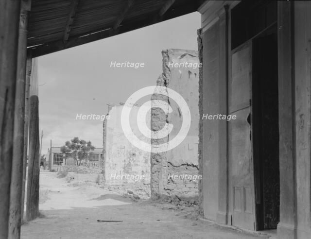 Scene in Tombstone, Arizona, once a thriving mining town, 1937. Creator: Dorothea Lange.