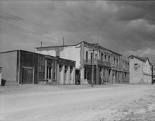 Scene in Tombstone, Arizona, once a thriving mining town, 1937. Creator: Dorothea Lange