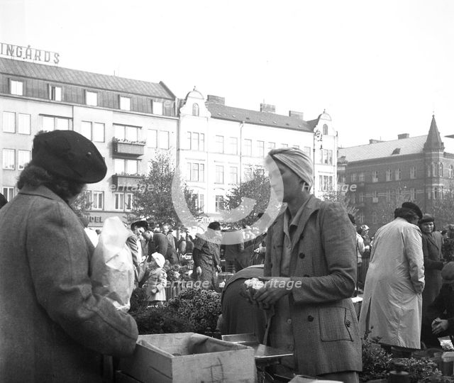 Scene in the market, Malmö, Sweden, 1947. Creator: Otto Ohm.