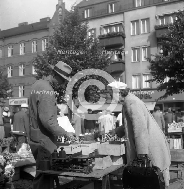 Scene in the market, Malmö, Sweden, 1947. Creator: Otto Ohm.