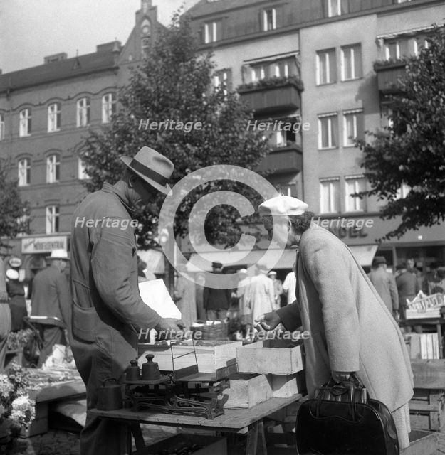 Scene in the market, Malmö, Sweden, 1947. Creator: Otto Ohm.