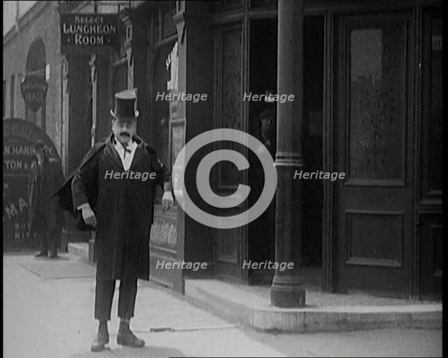Scenes of Comedian Billy Bennett Being Thrown Out of a Public House, 1929. Creator: British Pathe Ltd.