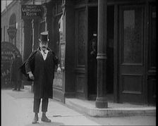 Scenes of Comedian Billy Bennett Being Thrown Out of a Public House, 1929. Creator: British Pathe Ltd