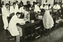 Scenes in a Native College - Students in the physics laboratory c1948. Creator: Unknown