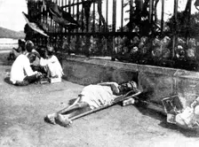 Scenes in Plague-Stricken Bombay: a wayside case, 1898. Creator: Gysi