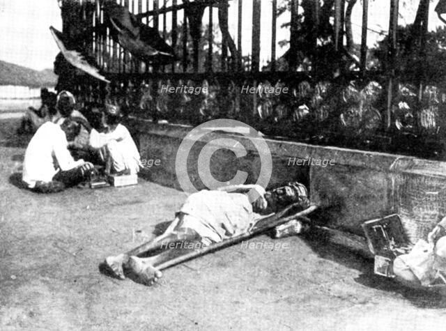 Scenes in Plague-Stricken Bombay: a wayside case, 1898. Creator: Gysi.