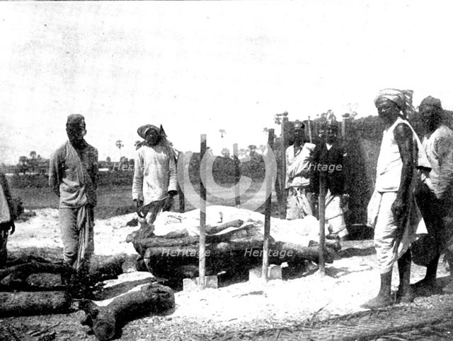 Scenes in Plague-Stricken Bombay: body lying on the pyre..., 1898. Creator: Gysi.
