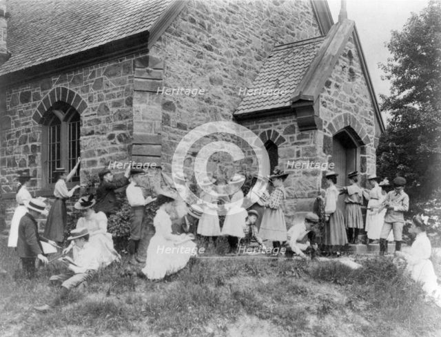 School children measuring and sketching at a stone building, Washington, D.C., (1899?). Creator: Frances Benjamin Johnston.