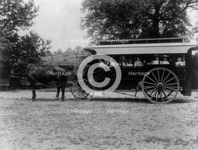 School children of the 6th Division in a horse-drawn car, (1899?). Creator: Frances Benjamin Johnston.