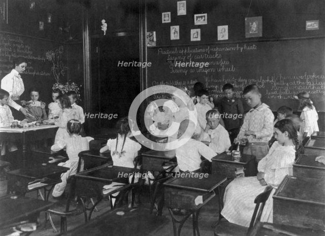 School children conducting simple experiments, Washington, D.C., (1899?). Creator: Frances Benjamin Johnston.