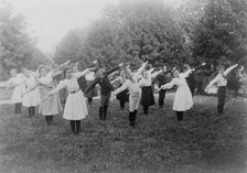 School children exercising on lawn, Washington, D.C., (1899?). Creator: Frances Benjamin Johnston