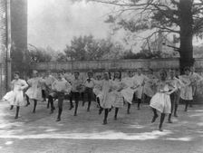 School children learning a dance in a school yard, Washington, D.C., (1899?). Creator: Frances Benjamin Johnston