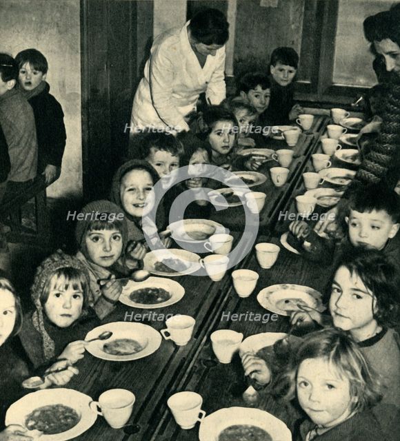 'School Dinner for Evacuated Children', 1943. Creator: Unknown.