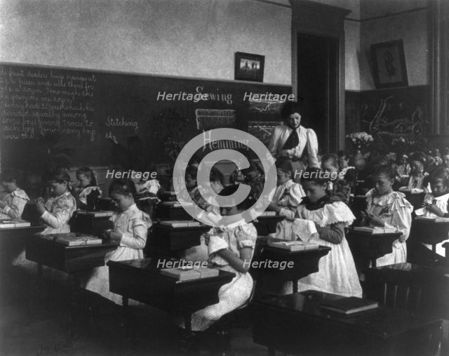 School girls in sewing class, (1899?). Creator: Frances Benjamin Johnston.