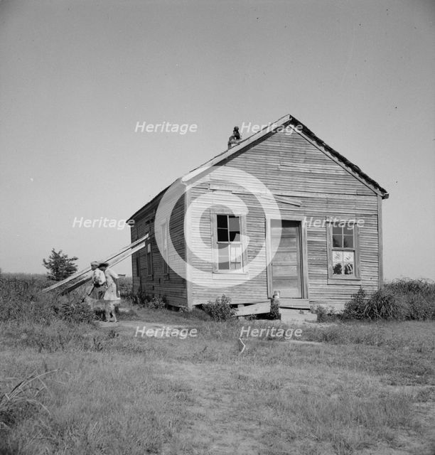 School in center of the mechanized plantation area of the Mississippi Delta, 1937. Creator: Dorothea Lange.