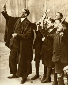 Schoolboys and teacher observing a solar eclipse, Britain, 1921, (1935). Creator: Unknown