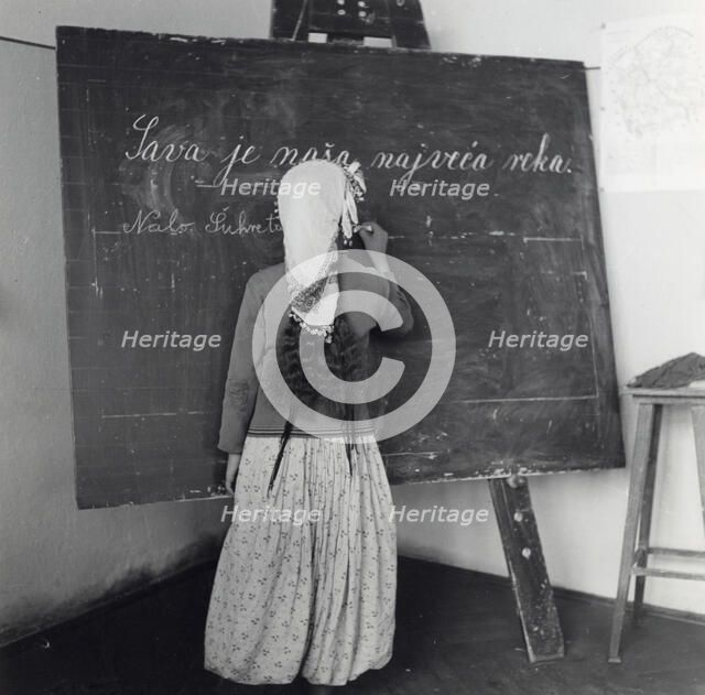 Schoolgirl in Sarajevo, Bosnia-Hercegovina, Yugoslavia, 1939. Artist: Unknown