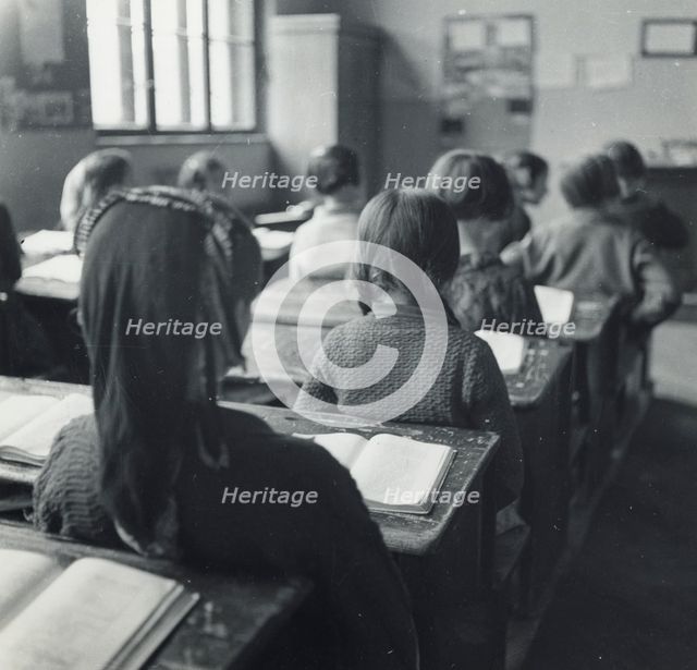 Schoolgirls in a classroom, Sarajevo, Bosnia and Hercegovina, Yugoslavia, 1939. Creator: Unknown.