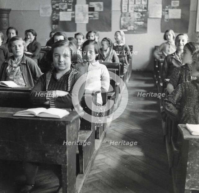Schoolgirls in a classroom, Sarajevo, Bosnia-Hercegovina, Yugoslavia, 1939. Artist: Unknown