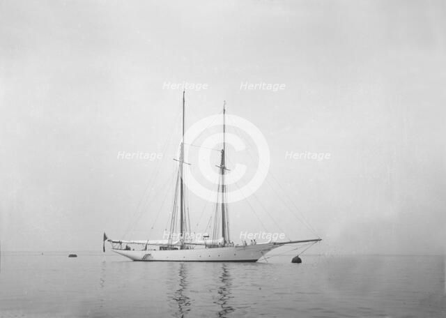 Schooner at anchor. Creator: Kirk & Sons of Cowes.